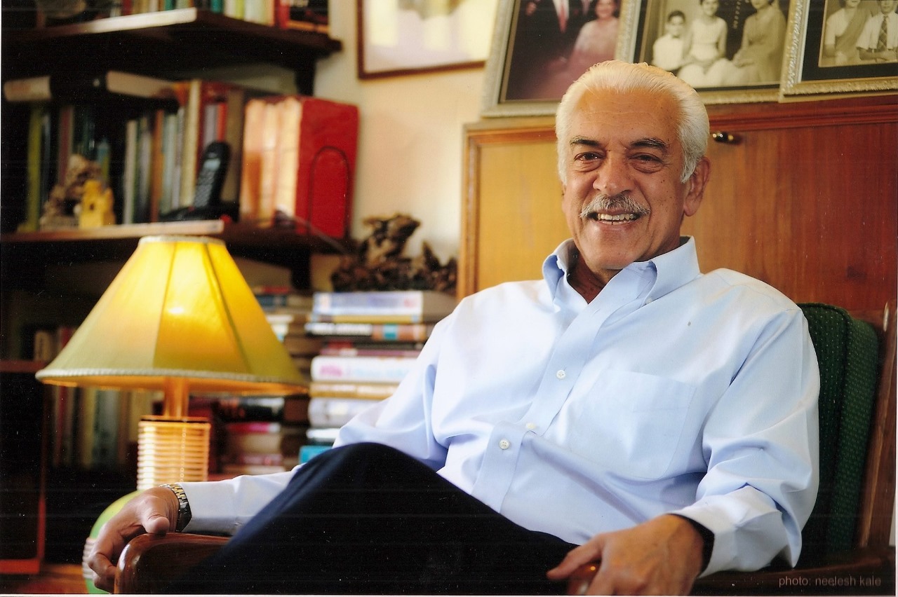 Arun Bhatia, former IAS officer, sitting in his office chair